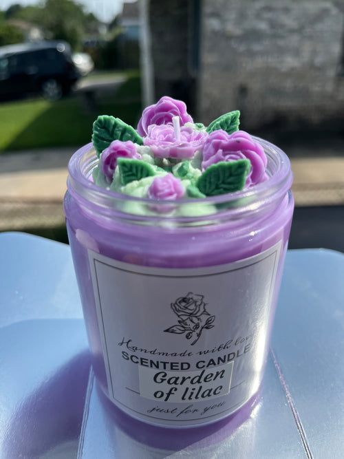 Garden of Lilac handmade scented candle with sculpted wax roses and green leaves by Scent of Galore